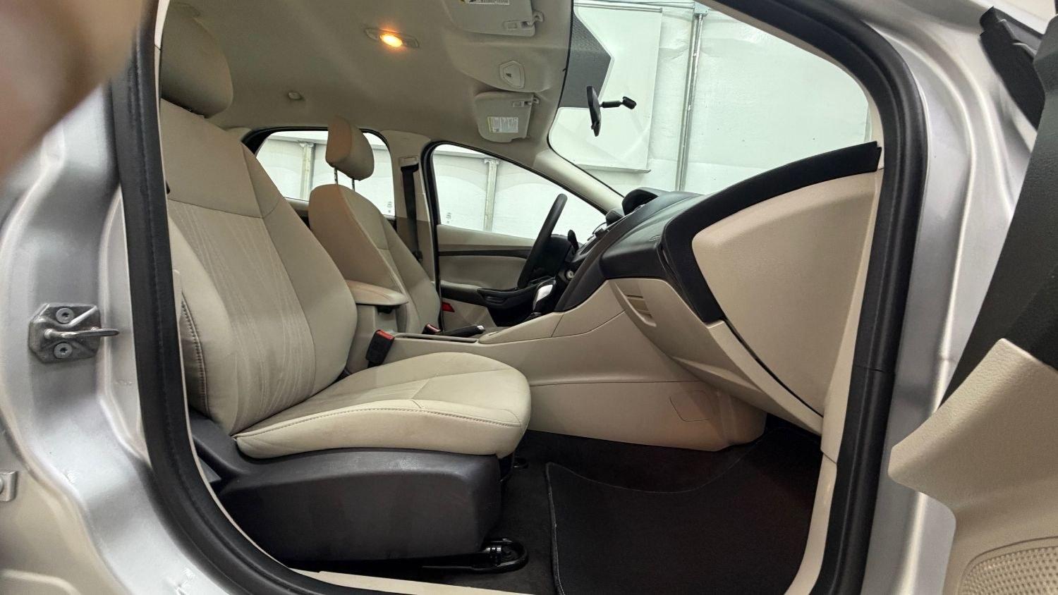 2018 Silver Ford Focus SE (1FADP3F23JL) , located at 1806 Veterans Memorial Hwy SW, Austell, GA, 30168, (770) 944-9558, 33.817959, -84.606987 - This Ford Focus SE has passed a 100+ point inspection performed in our own service center. It's very clean, with no issues to describe and no odors, and the tires are in great condition. Come see it in person and take it for a test drive! Why Choose Automania? At Automania, we make car buying easy- Photo#16