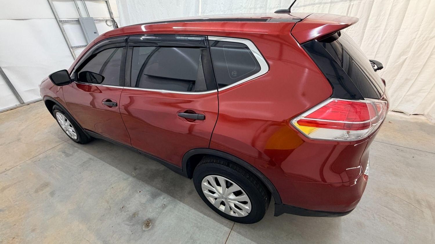 2016 Red Nissan Rogue S (JN8AT2MV0GW) with an 2.5L I-4 DOHC engine, located at 1806 Veterans Memorial Hwy SW, Austell, GA, 30168, (770) 944-9558, 33.817959, -84.606987 - This Nissan Rogue has passed a 100+ point inspection performed in our own service center. It's in great condition inside and out, and the tan interior is immaculate. Come see it in person and take it for a test drive! Why Choose Automania? At Automania, we make car buying easy and stress-free, with- Photo#2