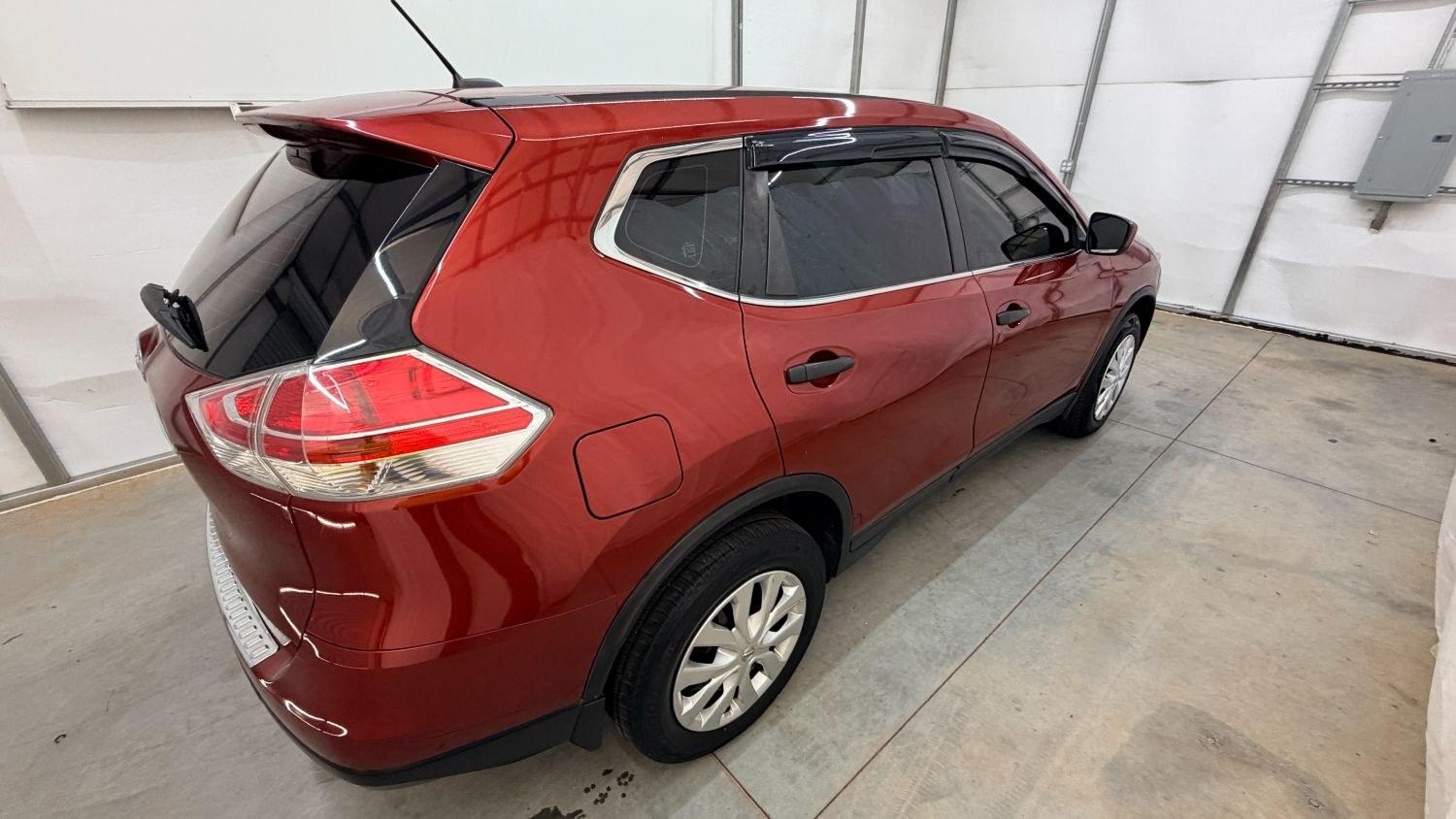 2016 Red Nissan Rogue S (JN8AT2MV0GW) with an 2.5L I-4 DOHC engine, located at 1806 Veterans Memorial Hwy SW, Austell, GA, 30168, (770) 944-9558, 33.817959, -84.606987 - This Nissan Rogue has passed a 100+ point inspection performed in our own service center. It's in great condition inside and out, and the tan interior is immaculate. Come see it in person and take it for a test drive! Why Choose Automania? At Automania, we make car buying easy and stress-free, with- Photo#5