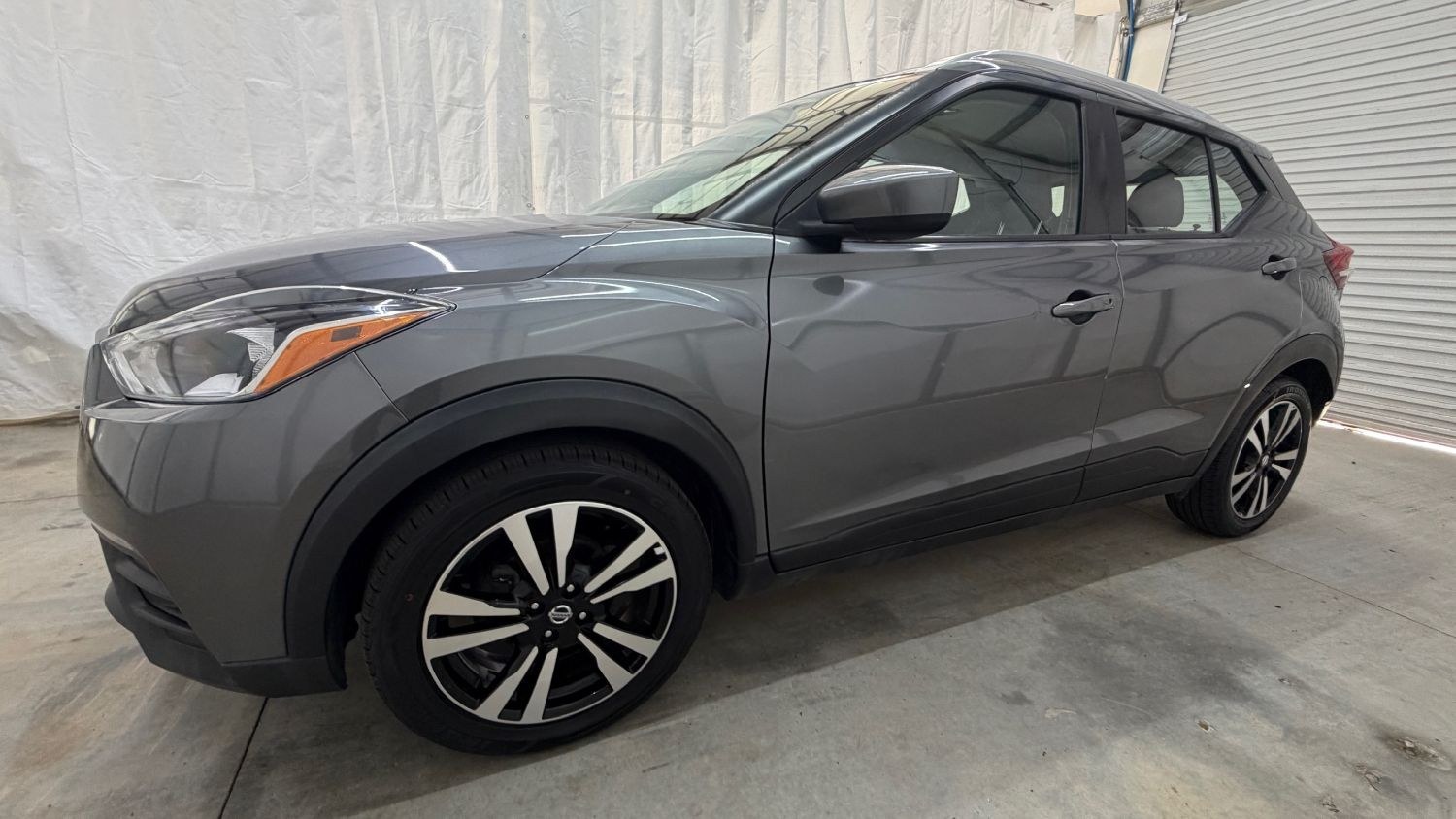 2019 Gray Nissan Kicks SV (3N1CP5CU9KL) with an 1.6L I-4 DOHC engine, located at 1806 Veterans Memorial Hwy SW, Austell, GA, 30168, (770) 944-9558, 33.817959, -84.606987- Photo#1