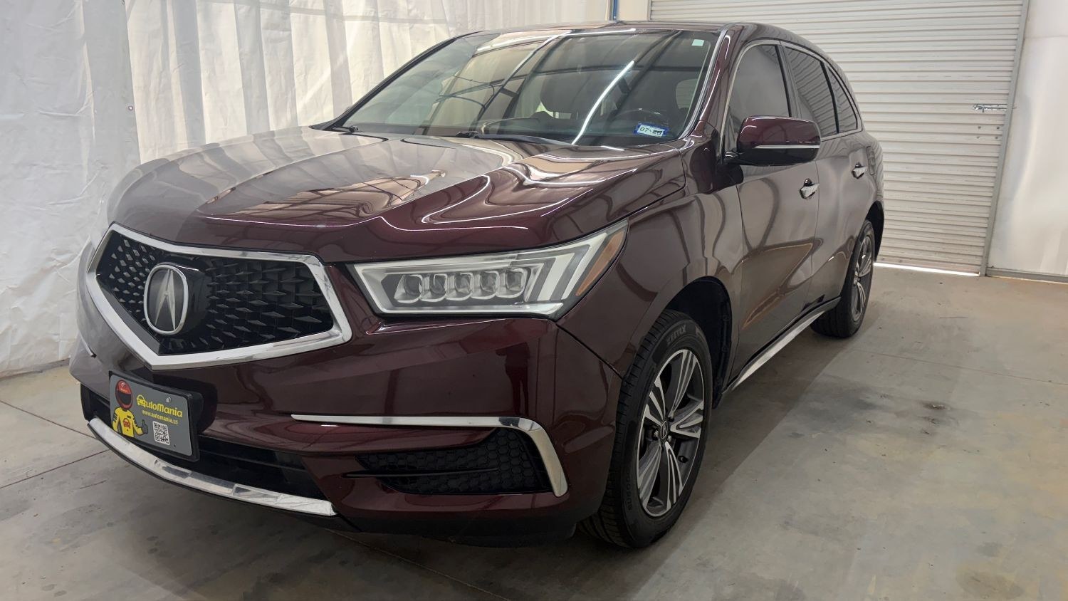 2017 Maroon Acura MDX Base (5FRYD3H39HB) , located at 1806 Veterans Memorial Hwy SW, Austell, GA, 30168, (770) 944-9558, 33.817959, -84.606987- Photo#0