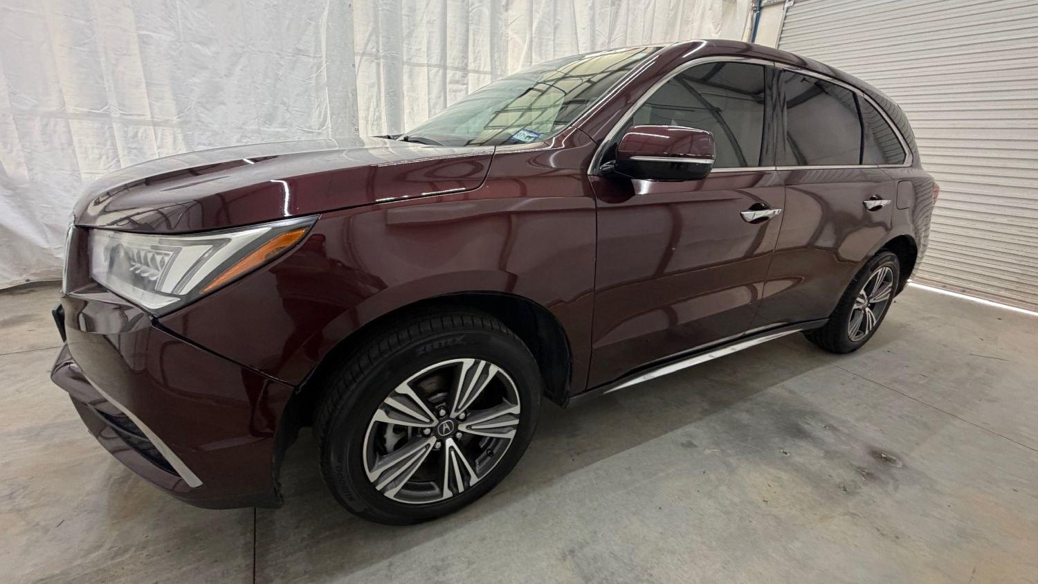 2017 Maroon Acura MDX Base (5FRYD3H39HB) , located at 1806 Veterans Memorial Hwy SW, Austell, GA, 30168, (770) 944-9558, 33.817959, -84.606987- Photo#1