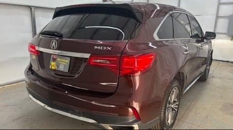 2017 Maroon Acura MDX Base (5FRYD3H39HB) , located at 1806 Veterans Memorial Hwy SW, Austell, GA, 30168, (770) 944-9558, 33.817959, -84.606987- Photo#5