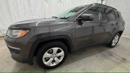 2018 Gray Jeep Compass Latitude FWD (3C4NJCBB8JT) with an 2.4L I-4 variable valve control engine, located at 1806 Veterans Memorial Hwy SW, Austell, GA, 30168, (770) 944-9558, 33.817959, -84.606987- Photo#1