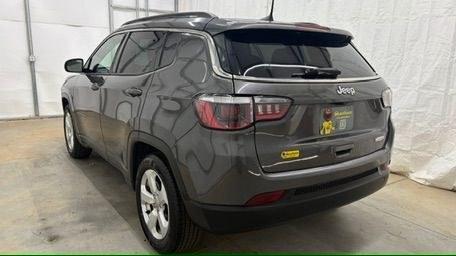 2018 Gray Jeep Compass Latitude FWD (3C4NJCBB8JT) with an 2.4L I-4 variable valve control engine, located at 1806 Veterans Memorial Hwy SW, Austell, GA, 30168, (770) 944-9558, 33.817959, -84.606987- Photo#3
