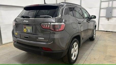 2018 Gray Jeep Compass Latitude FWD (3C4NJCBB8JT) with an 2.4L I-4 variable valve control engine, located at 1806 Veterans Memorial Hwy SW, Austell, GA, 30168, (770) 944-9558, 33.817959, -84.606987- Photo#5